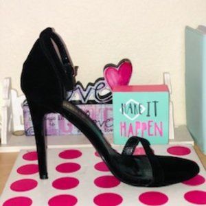 Black stiletto heeled shoe with strap